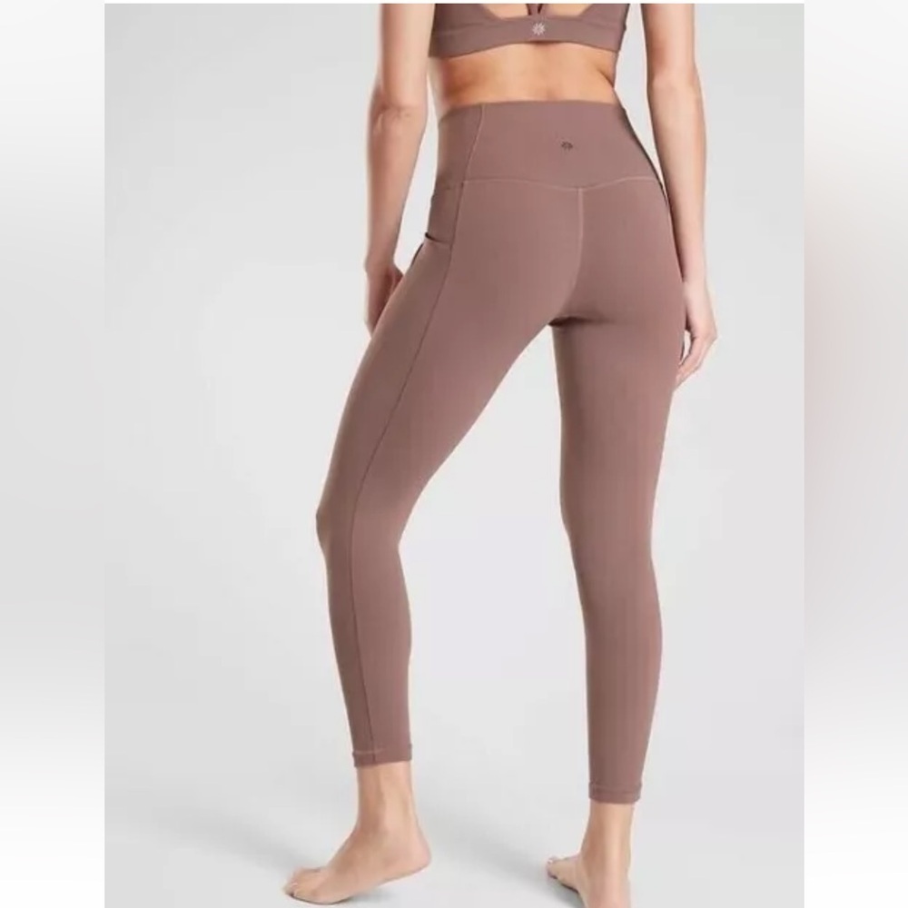 Athleta Salutation Stash Tight Size Large - Picture 3 of 8